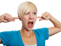 Woman covering ears